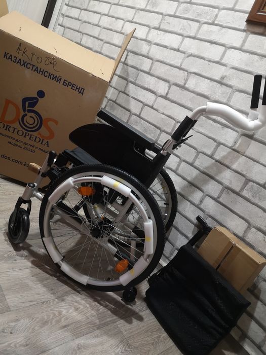 Инвалидная детская коляска