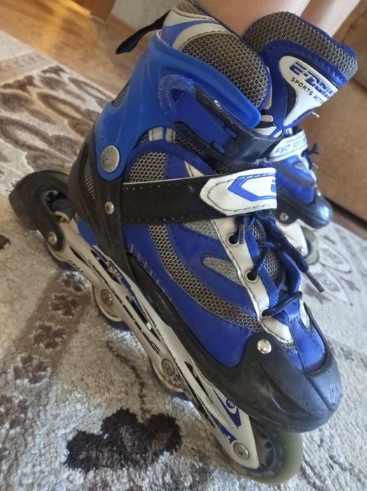 Роликовые коньки