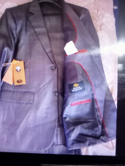 Продам костюмы мужские