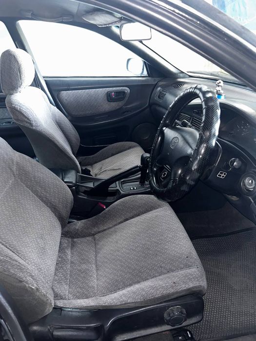 Тайота карона эксив