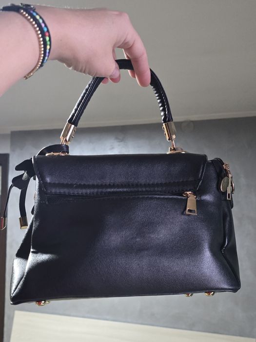 Geanta de mana ca noua