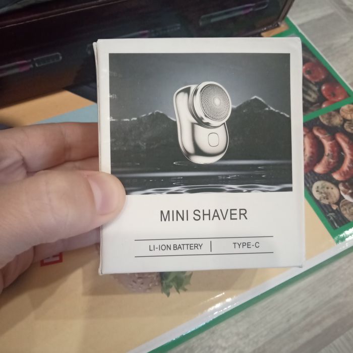 Электронная бритва машинка