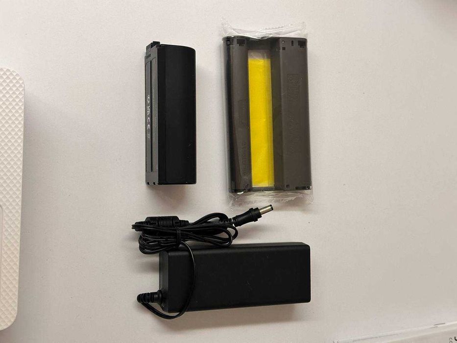 Canon Selphy CP1500 + Baterie Externă + Set 70+ Foi (Ca Nouă)