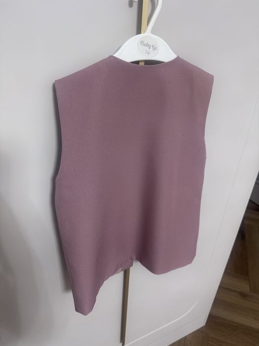 Продам жилет на 6-7 лет