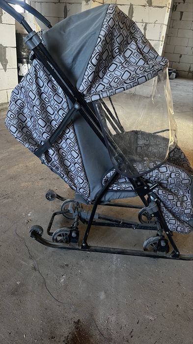 санки-коляска на колесах