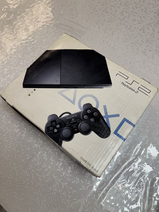 PlayStation 2 Slim yangidek holatda