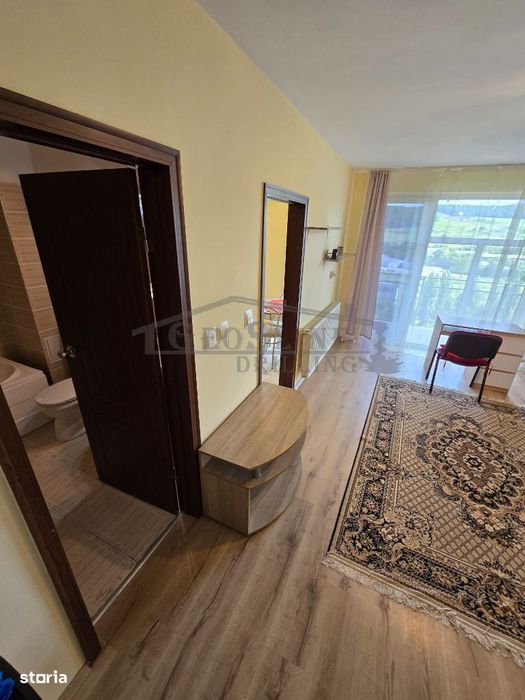 Apartament 1 cameră decomandată Bucătărie separată Parcare exterioară