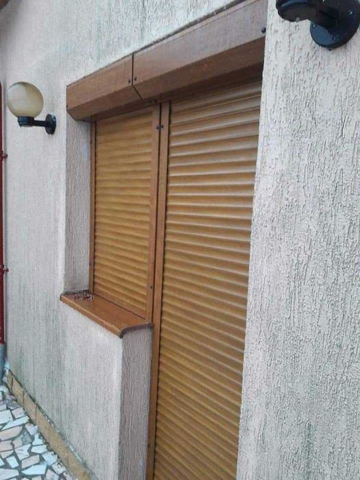 RULOURI Aluminiu si Usi de garaj rezidentiale SECTIONALE