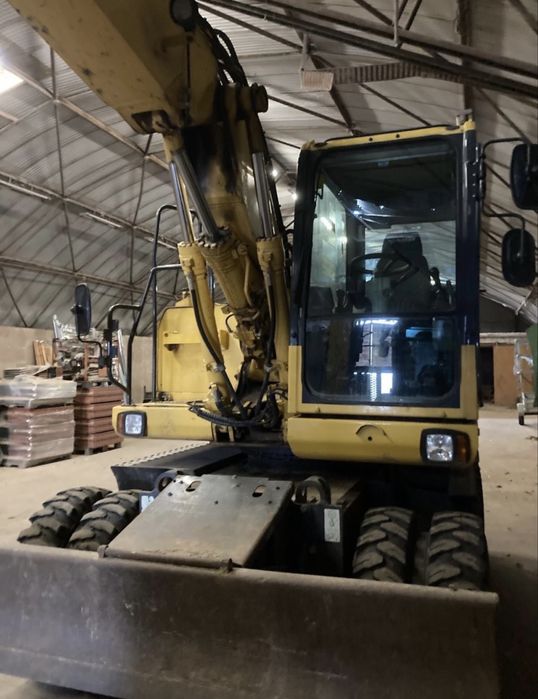 Excavator pe roti Komatsu PW148-8 2014/5399h/2xcupe/13-16tone/Germania