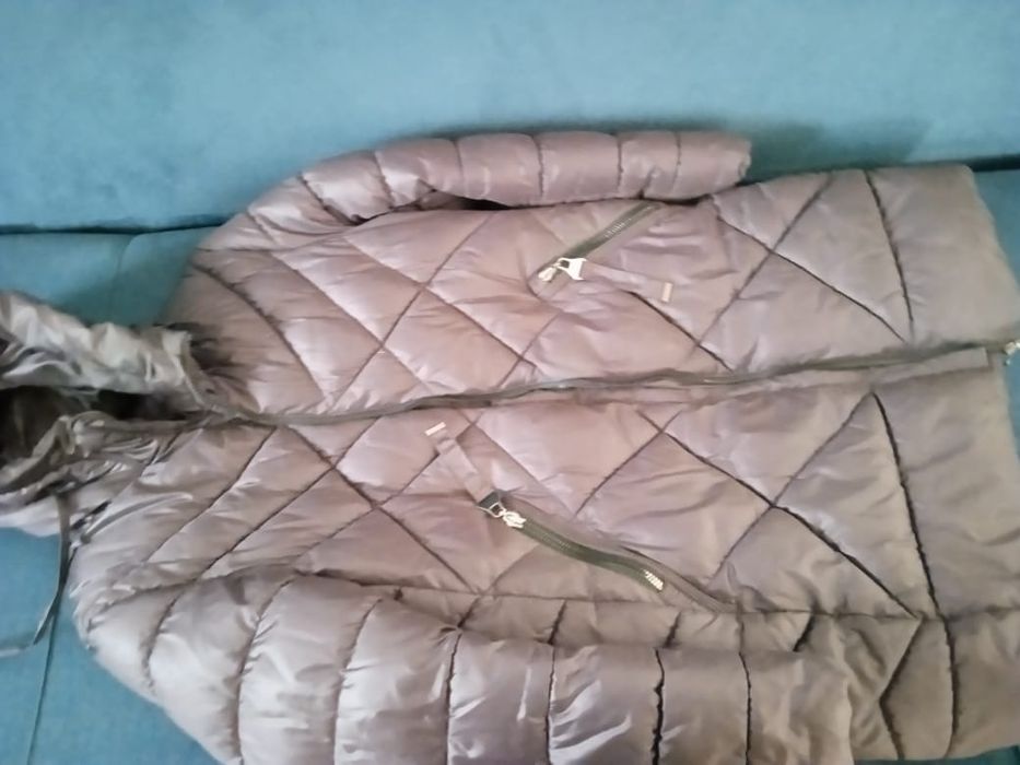 Продам пуховики разные