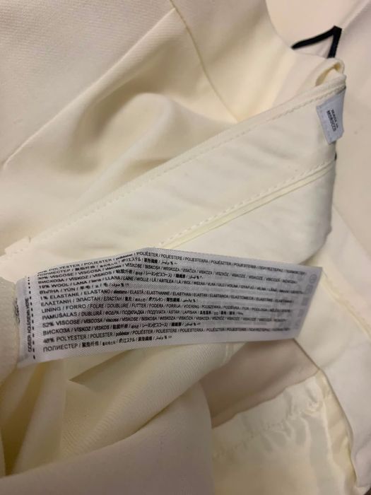 Pantaloni Mango drepti alb-crema