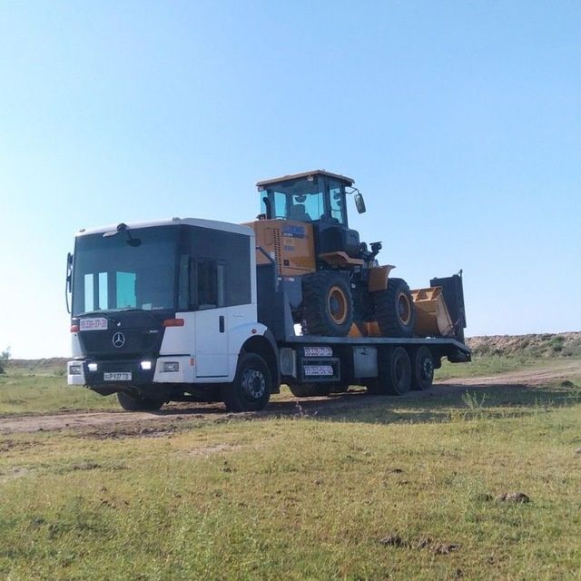 Услуга трал эвакуатор траллер перевозка спецтехника