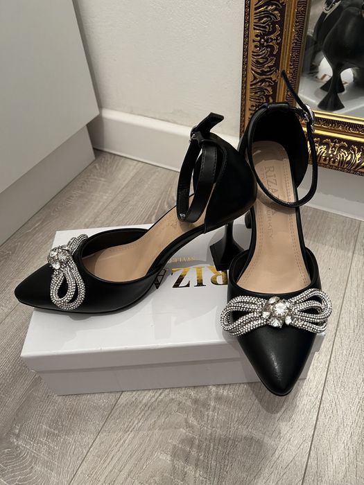 черные туфли с бантом из страз