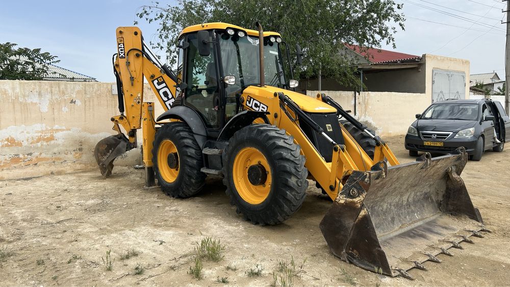 Экскаватор погрузчик Jcb трактор