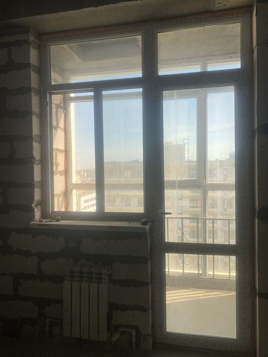 Балкон  пластиковое окно