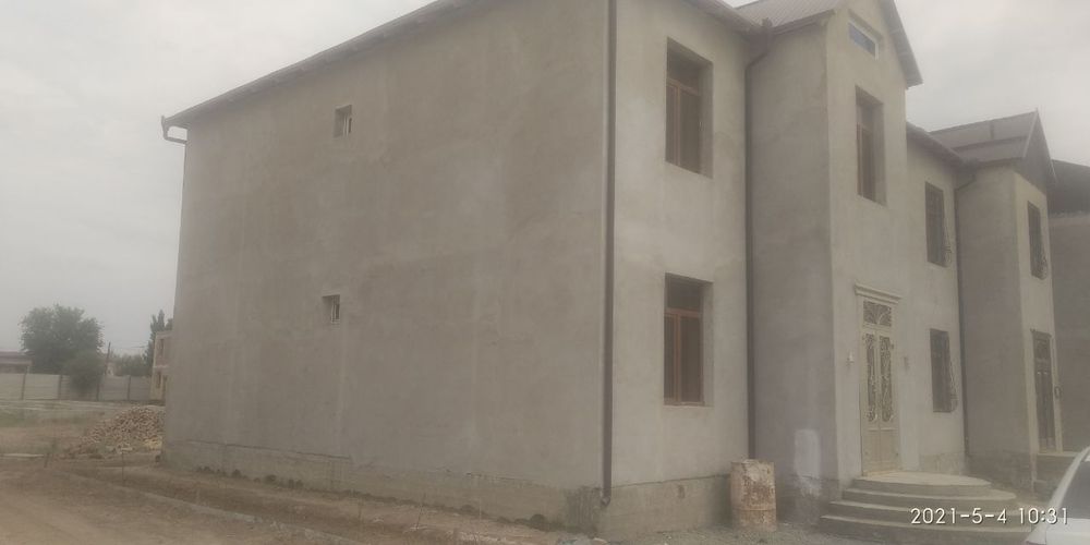 Урганч туманида икки қаватли уй сотилади.