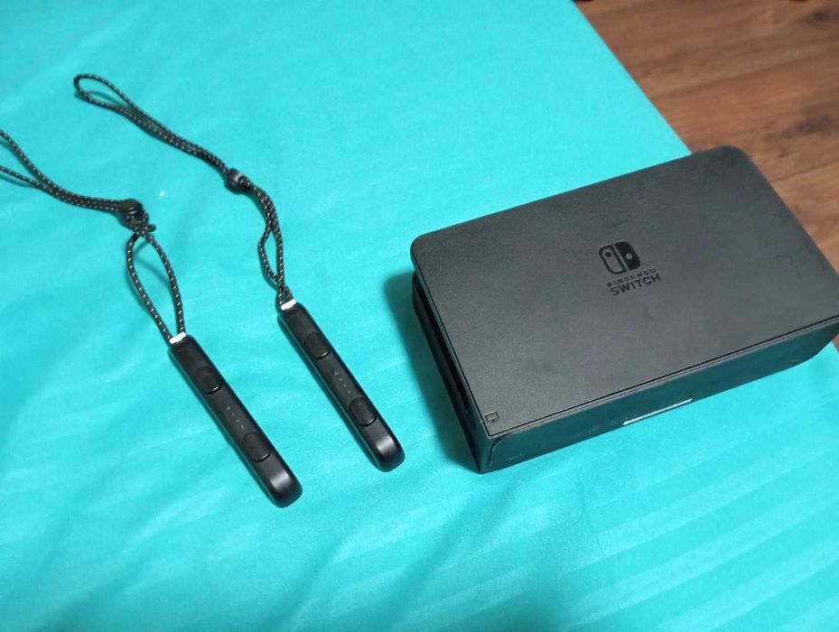 Много запазено NINTENDO SWITCH QLED с четири игри