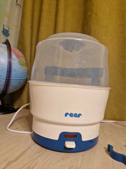 Парен стерилизатор за бебешки принадлежности