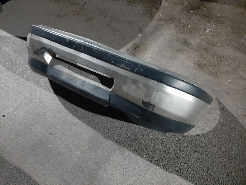 Бампер мазда 323