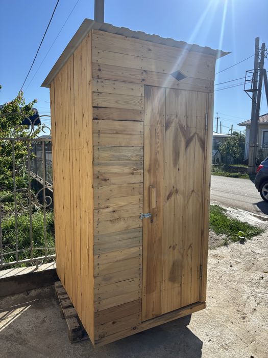 Таза агаштан жасалынган Туалет