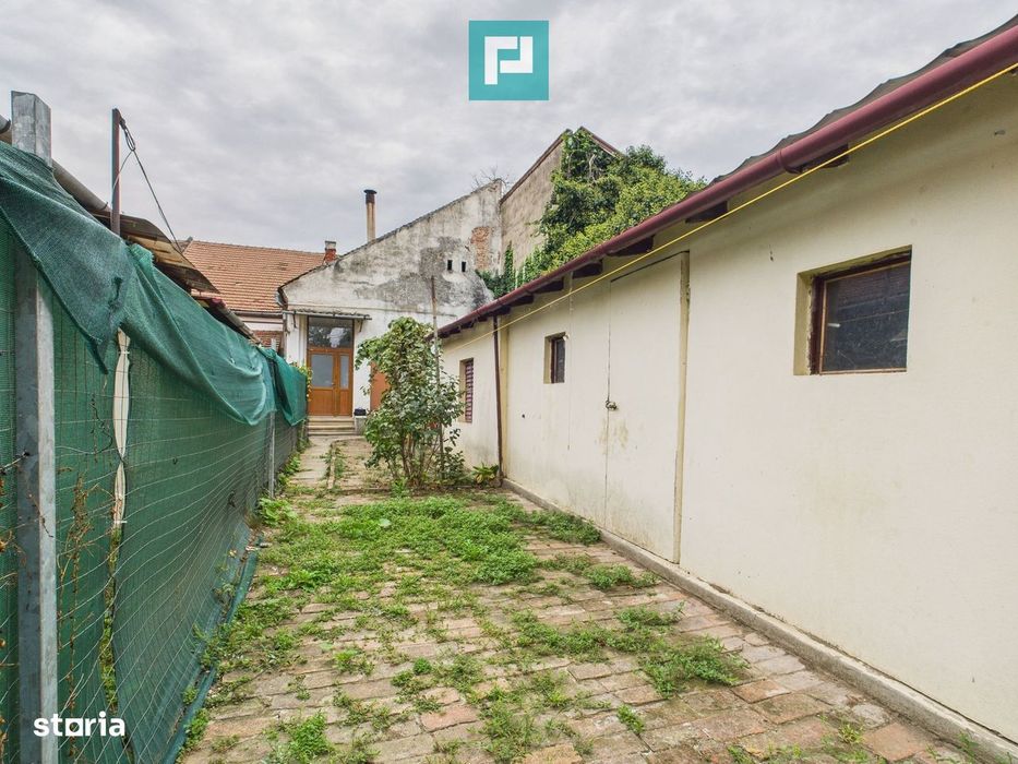 Casă 2 camere + anexe, teren 234 mp.