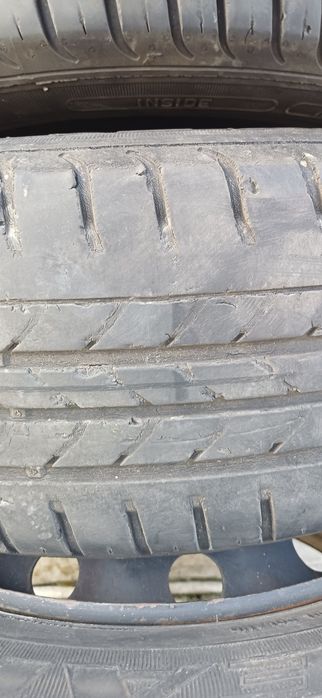 4 jante de tabla cu anvelope de vara si capace originale logan 1