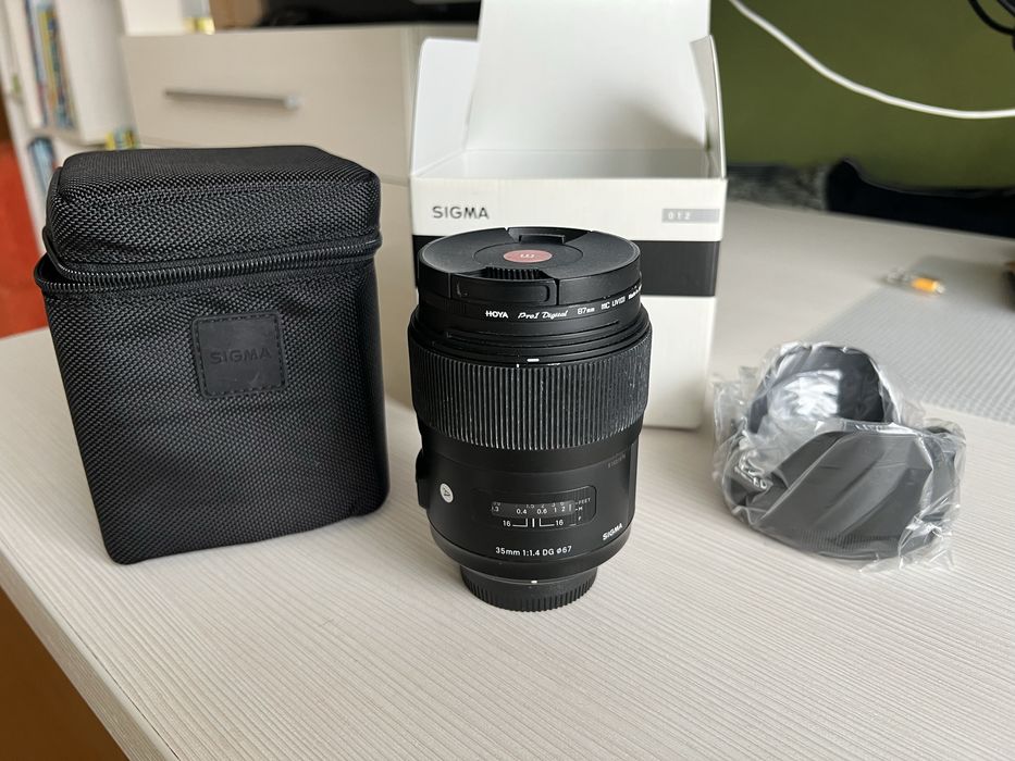 Obiectiv Sigma 35mm F1.4 DG + filtru hoya montura Nikon