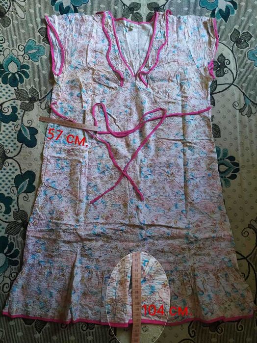 Женская одежда, типа сарафан.