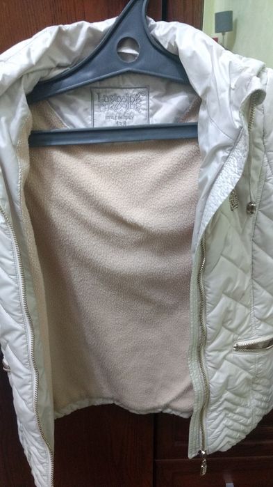 Куртки на девочку 7-8лет