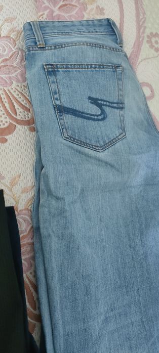 Джинсы состояние новых
