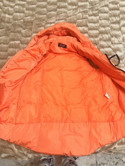 Жилет утепленный с капюшоном