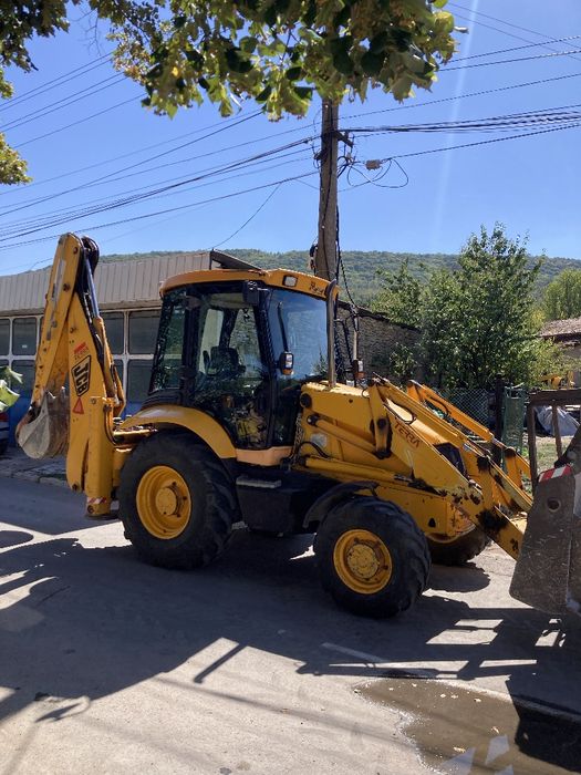 Услуги с комбиниран багер,бобкат  и  самосвали.