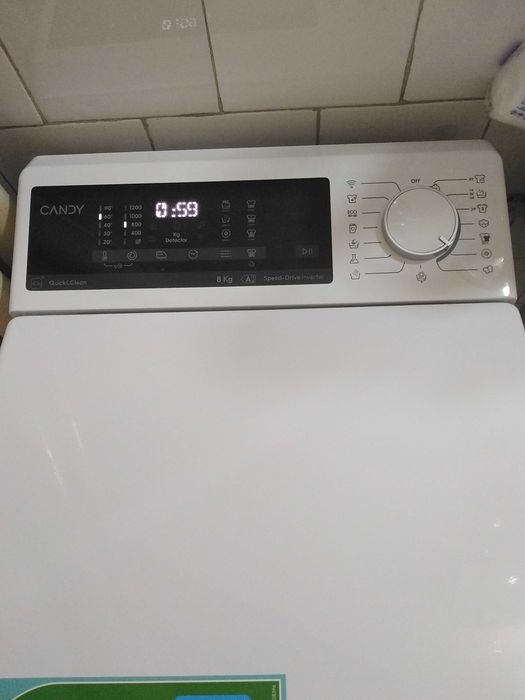 Vand masina de spalat verticala CANDY 1200 rpm,casa A,,folosita 4 luni,inca in garantie.Silentioasa,spala impecabil.