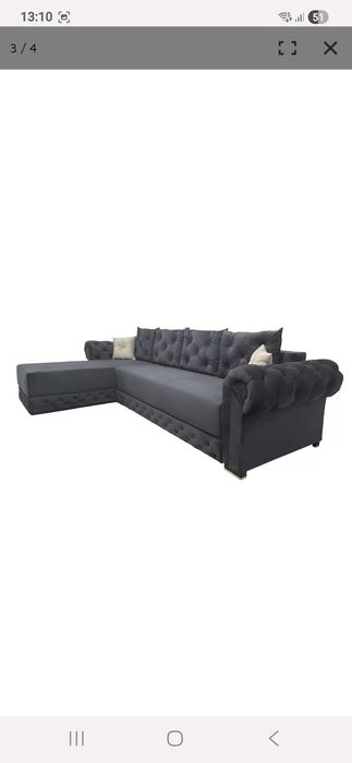 Colțar extensibil gri cu spătar și brațe Chesterfield