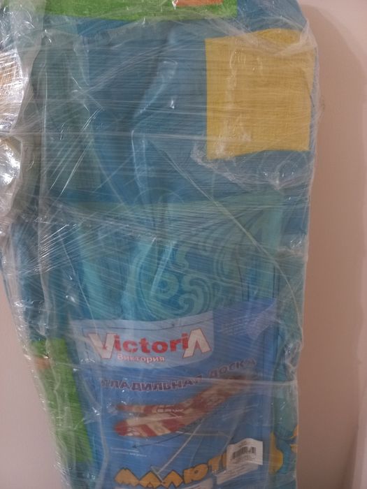 Обогреватель и гладильная доска