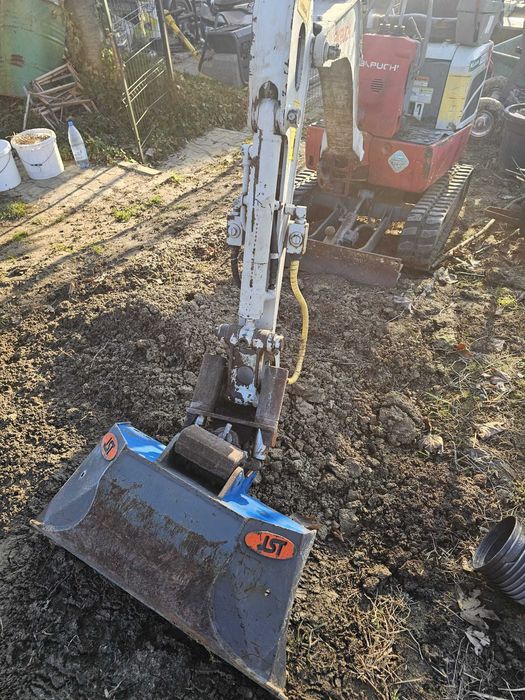 Miniexcavator takeuchi TB12 1.2 tone