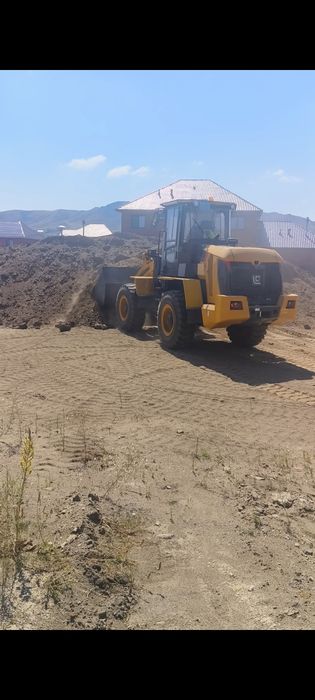 Услуги фронтального погрузчика.