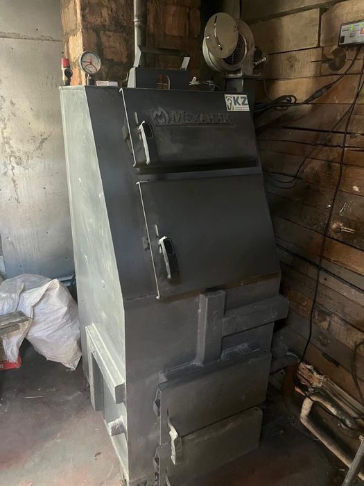 Котел длительного горения Механик