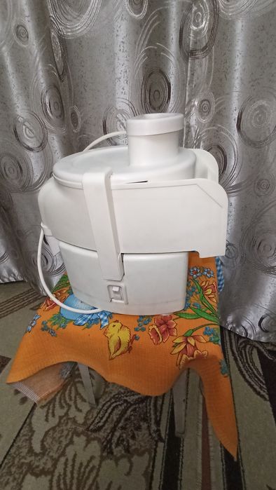 Продам электросоковыжималку.