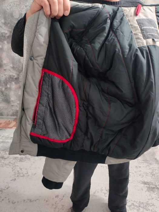 Продам оригинальный пуховик