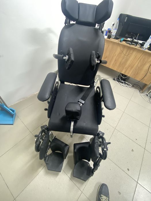 Многофункциональная инвалидная коляска