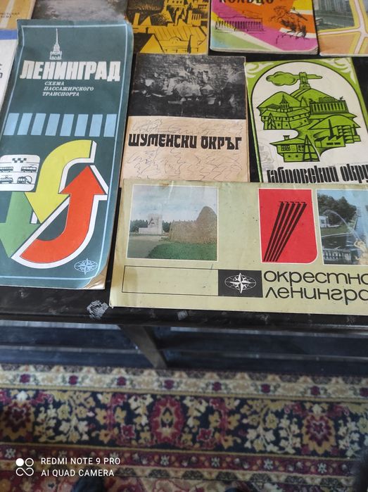 Наборы открыток и схемы городов.