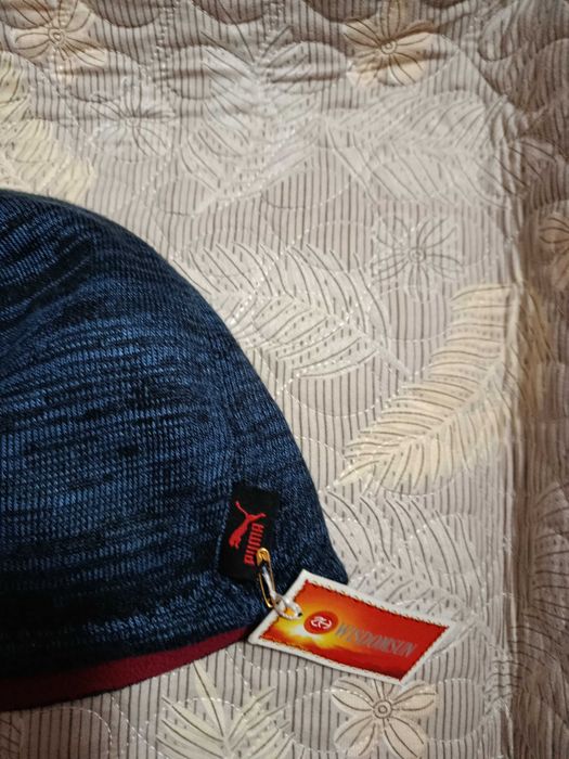 Продам  шапку   двусторония  в  нутрий  флис