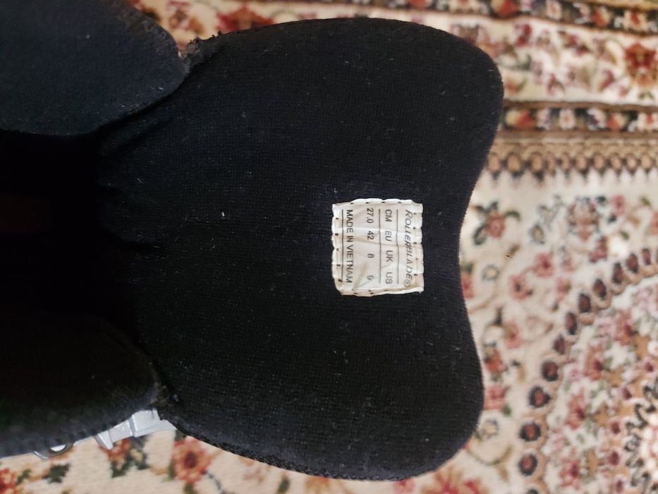 Роликовые коньки