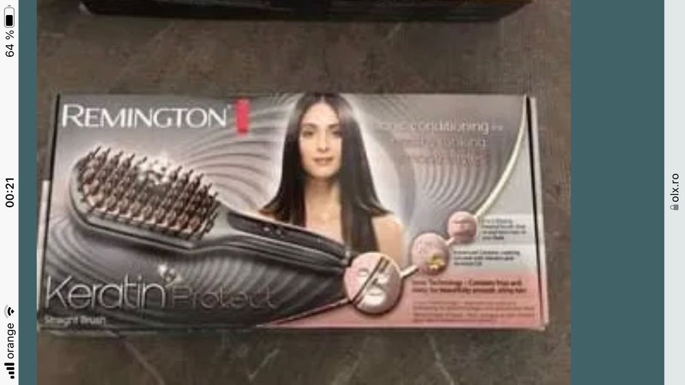 Perie de intins parul pe baza de cheratina