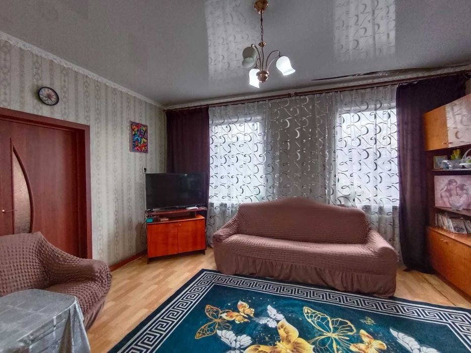 Продаю 4 комнатный дом в Пришахтинске.