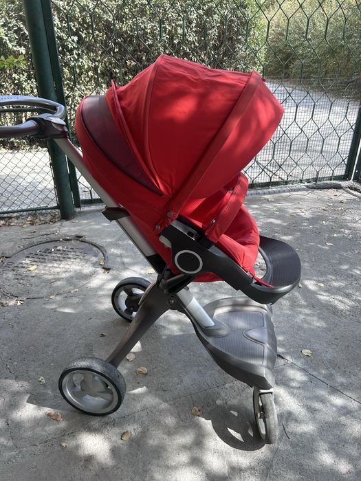 Детская коляска”Stokke”