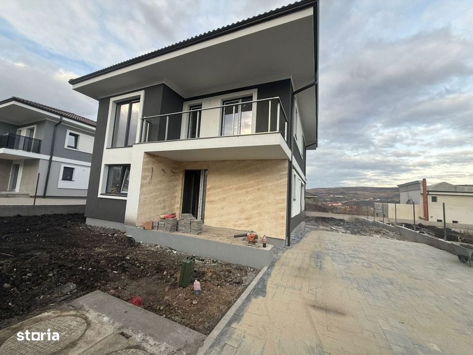 Casa individuala la pret de apartament , Chinteni 500mp de teren