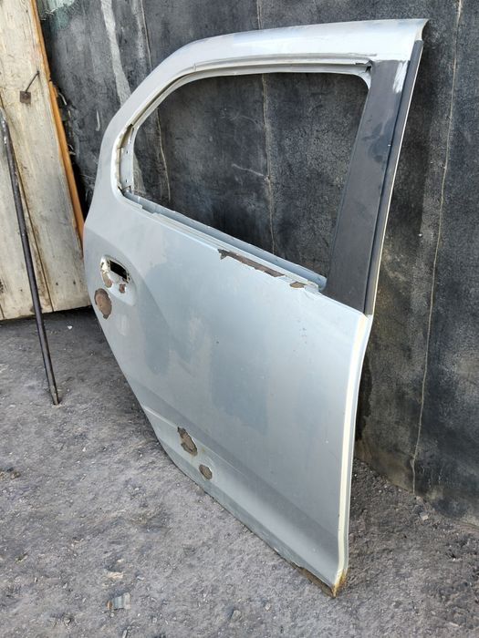 Дверь Рено Логан 2