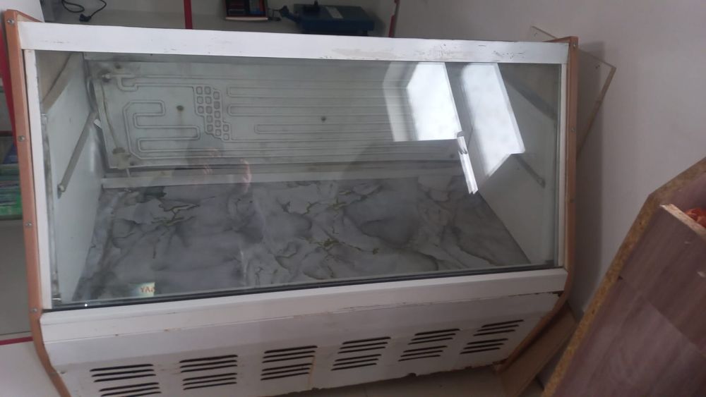 Магазинге қоятын холодильник